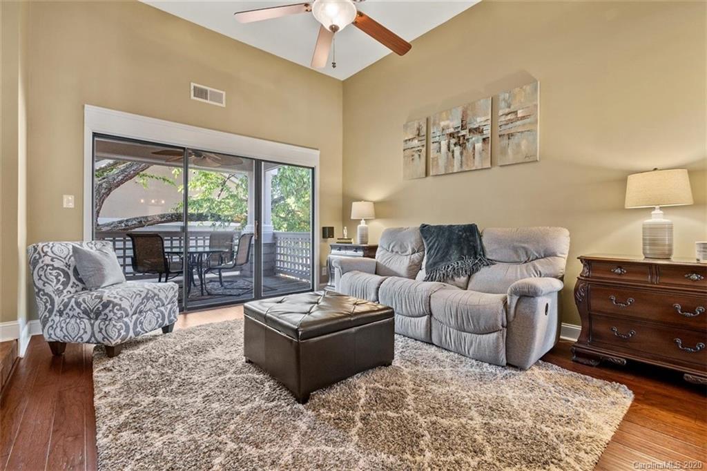 232 Queens Road, Unit 39 Charlotte, NC 28204 - Photo 15 of 29 a living room with furniture and a large window