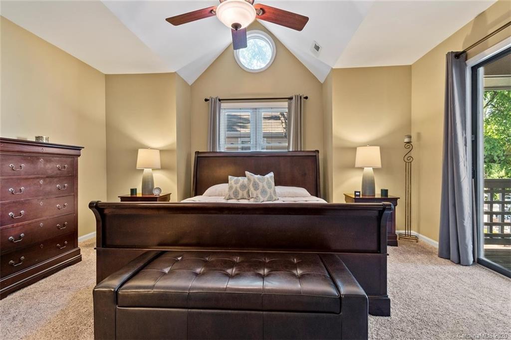 232 Queens Road, Unit 39 Charlotte, NC 28204 - Photo 23 of 29 a living room with furniture and window