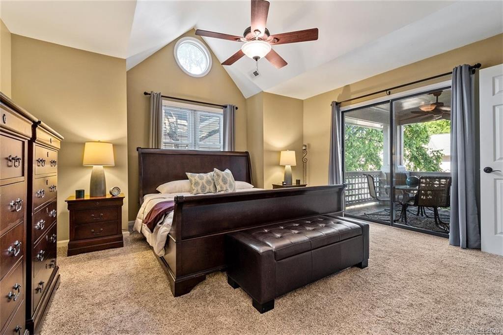 232 Queens Road, Unit 39 Charlotte, NC 28204 - Photo 25 of 29 a bed room with couch and a window