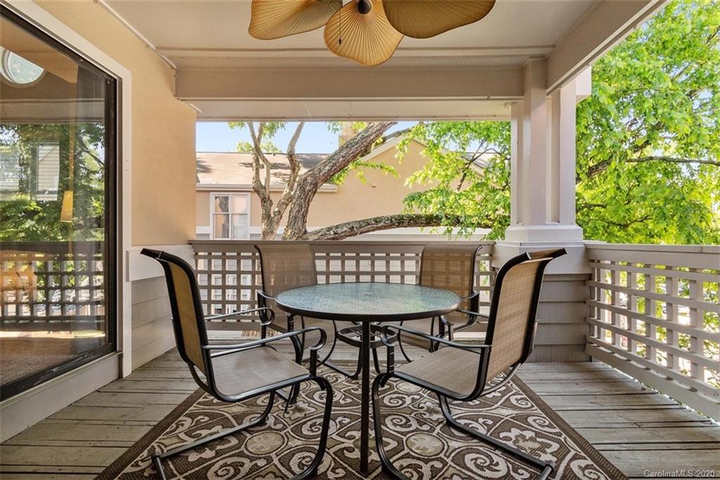 232 Queens Road, Unit 39 Charlotte, NC 28204 - Photo 28 of 29 a view of a dining room with furniture window and outside view