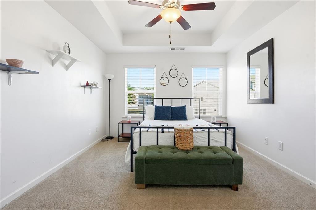 5026 Longview Walk Decatur, GA 30035 - Photo 11 of 31 a living room with furniture and a chandelier