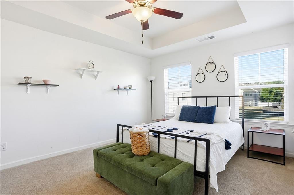 5026 Longview Walk Decatur, GA 30035 - Photo 13 of 31 a bedroom with a bed couch and window