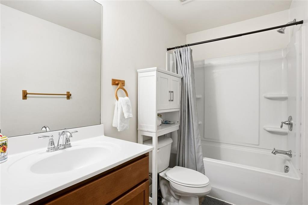 5026 Longview Walk Decatur, GA 30035 - Photo 18 of 31 a bathroom with a sink toilet and shower