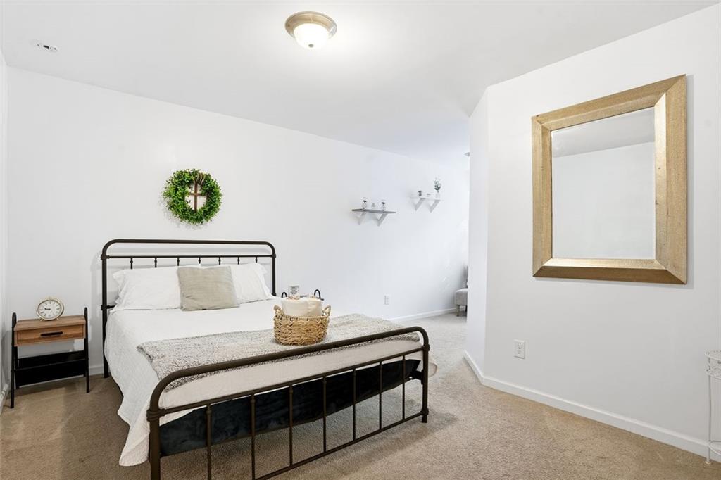 5026 Longview Walk Decatur, GA 30035 - Photo 19 of 31 a bedroom with a bed and a window