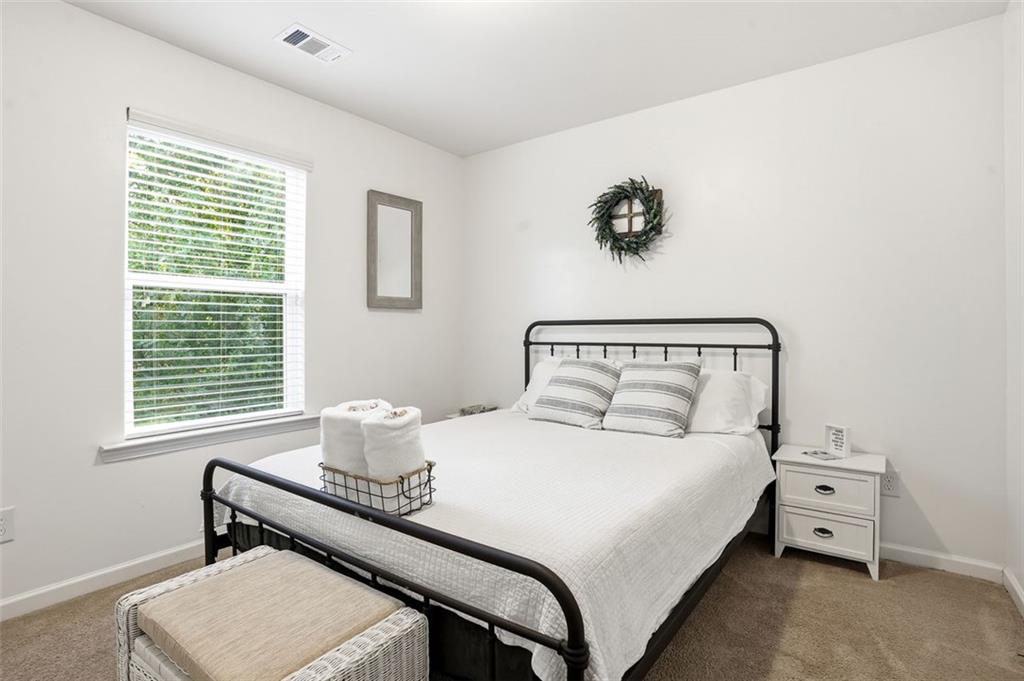 5026 Longview Walk Decatur, GA 30035 - Photo 22 of 31 a bedroom with a bed and a window