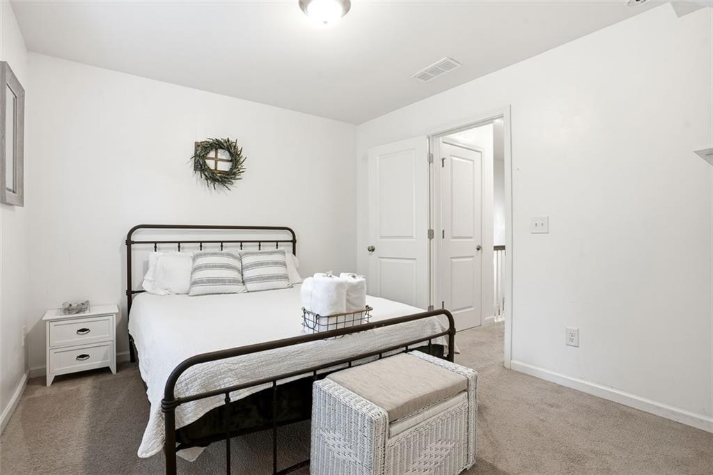 5026 Longview Walk Decatur, GA 30035 - Photo 23 of 31 a bedroom with a bed and a table