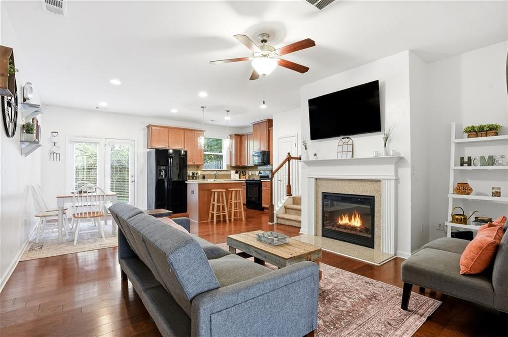 5026 Longview Walk Decatur, GA 30035 - Photo 3 of 31 a living room with furniture fireplace and flat screen tv