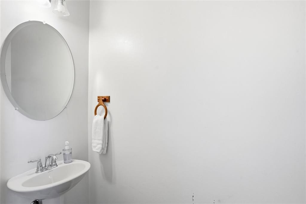5026 Longview Walk Decatur, GA 30035 - Photo 9 of 31 a bathroom with a sink and a mirror