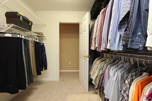 4144 Walter Road Bethlehem, PA 18020 - Photo 15 of 46 a view of walk in closet with clothes and shoes