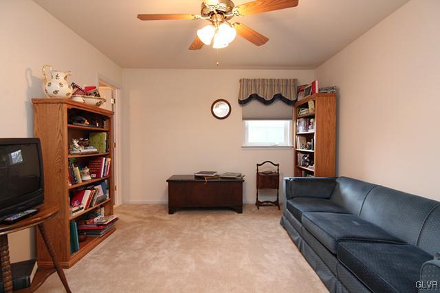 4144 Walter Road Bethlehem, PA 18020 - Photo 18 of 46 a living room with furniture and a flat screen tv