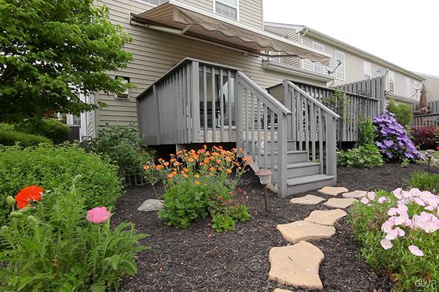 4144 Walter Road Bethlehem, PA 18020 - Photo 2 of 46 a backyard of a house with flower pots
