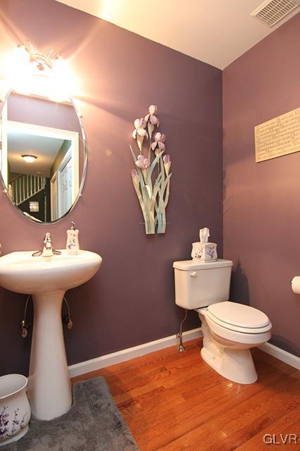 4144 Walter Road Bethlehem, PA 18020 - Photo 21 of 46 a bathroom with a sink toilet and mirror
