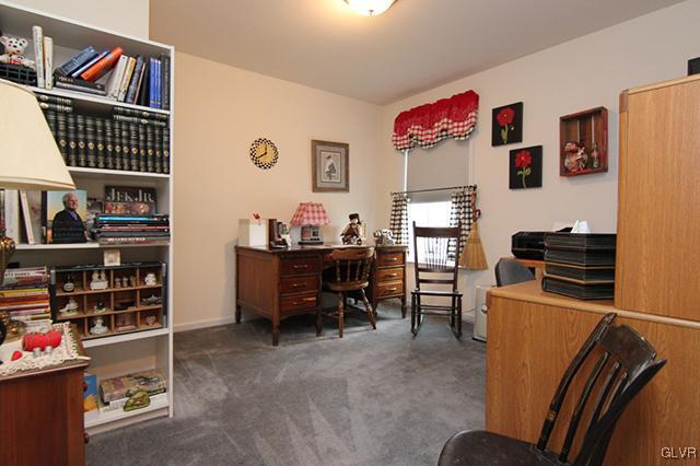 4144 Walter Road Bethlehem, PA 18020 - Photo 22 of 46 a living room with furniture cabinets and a book shelf