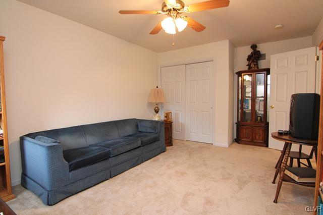 4144 Walter Road Bethlehem, PA 18020 - Photo 24 of 46 a living room with furniture and a flat screen tv