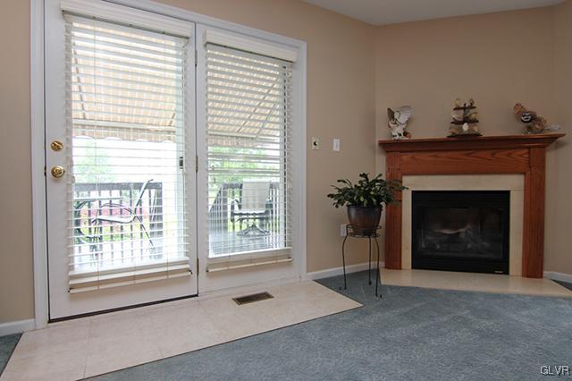 4144 Walter Road Bethlehem, PA 18020 - Photo 30 of 46 a living room with furniture and a fireplace