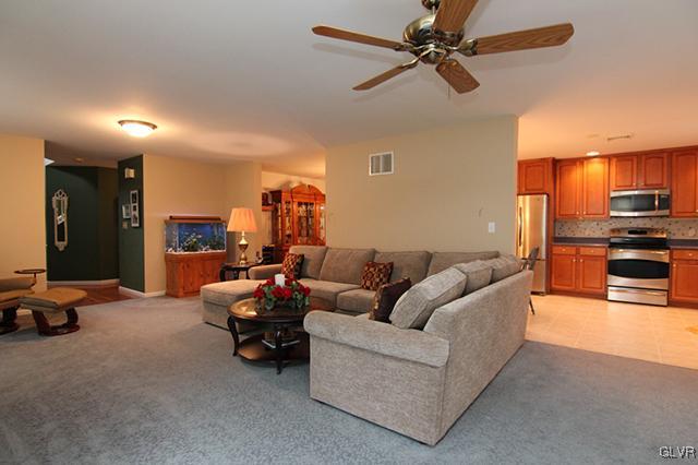 4144 Walter Road Bethlehem, PA 18020 - Photo 34 of 46 a living room with furniture and a chandelier