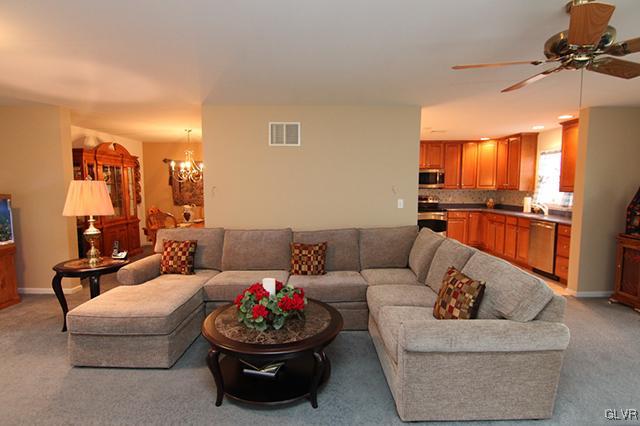 4144 Walter Road Bethlehem, PA 18020 - Photo 35 of 46 a living room with furniture and a chandelier