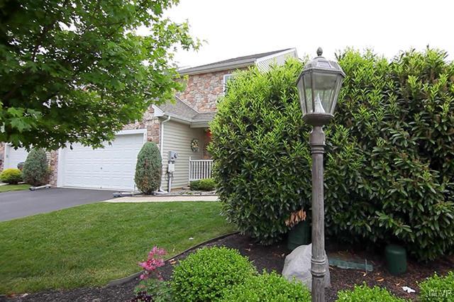 4144 Walter Road Bethlehem, PA 18020 - Photo 38 of 46 a front view of a house with a yard and potted plants