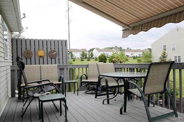 4144 Walter Road Bethlehem, PA 18020 - Photo 41 of 46 a view of a chairs and table on the deck