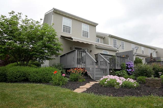 4144 Walter Road Bethlehem, PA 18020 - Photo 44 of 46 a view of a house with a small yard plants and large tree
