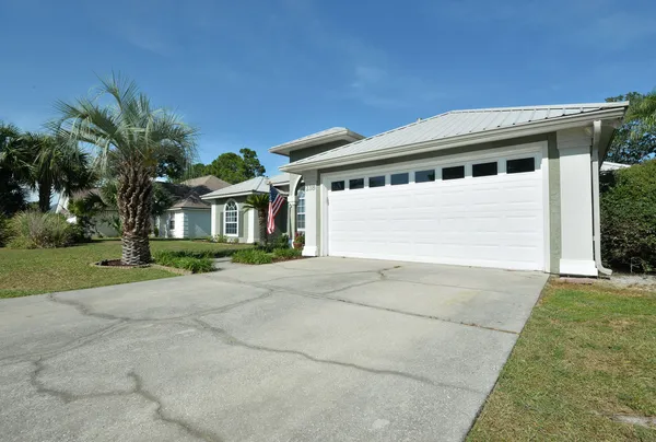 a kitchen with a refrigerator stove and microwave