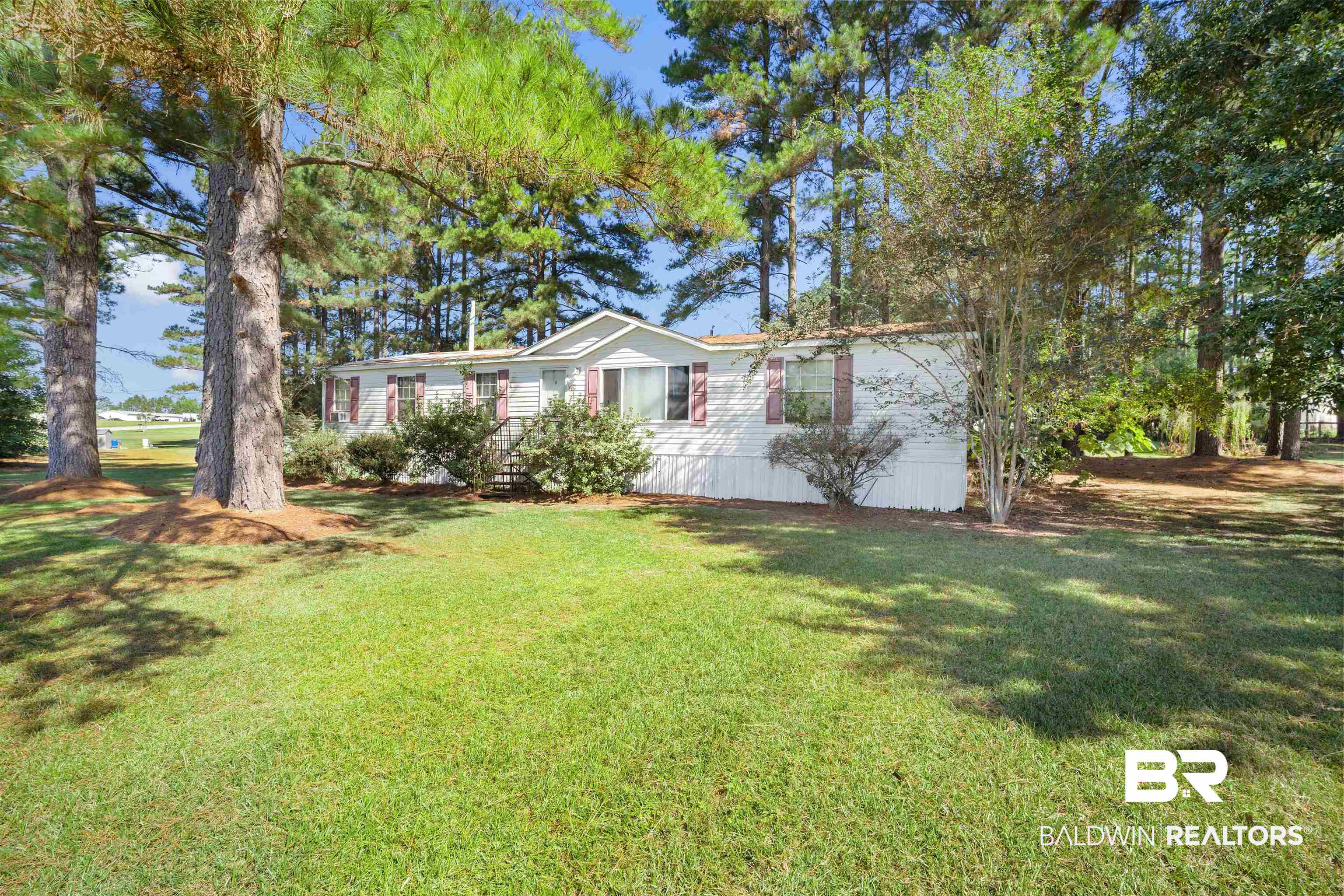 23700 Cumberland Road Robertsdale, AL 36567 - Photo 4 of 33 Manufactured / mobile home featuring a front yard