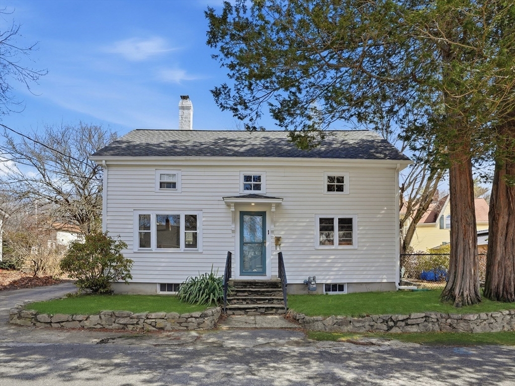 1 North Street Framingham, MA 01701 - Photo 1 of 22 a front view of a house with garden