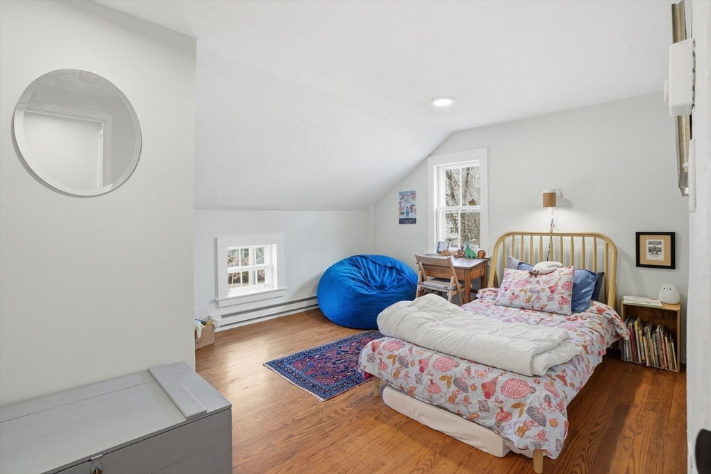 1 North Street Framingham, MA 01701 - Photo 16 of 22 a bedroom with two beds and a potted plant