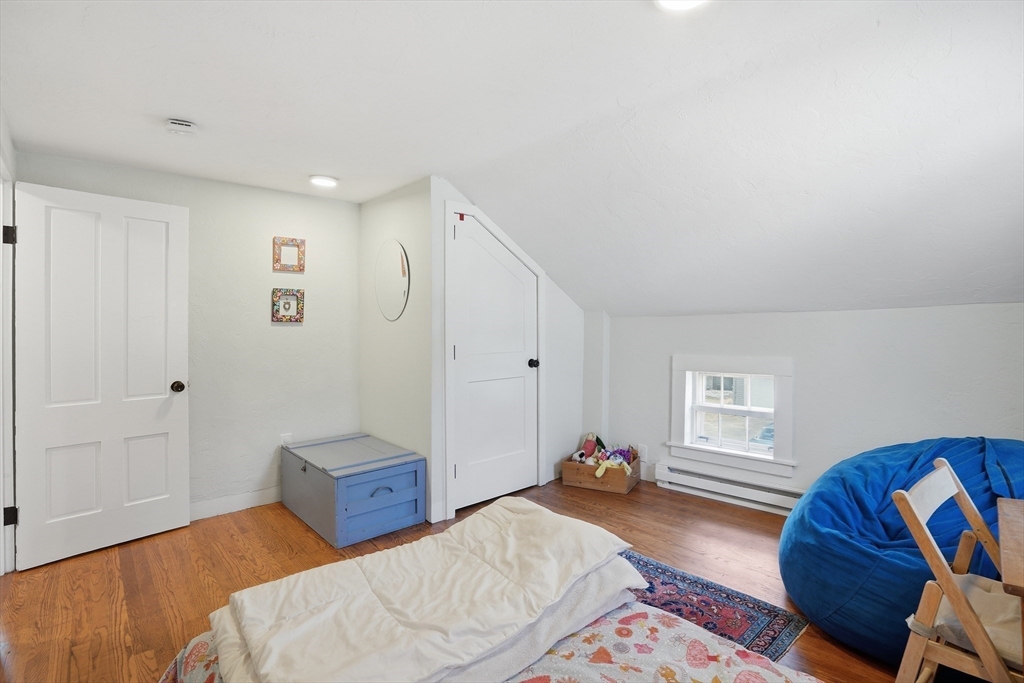 1 North Street Framingham, MA 01701 - Photo 17 of 22 a bedroom with furniture and a window