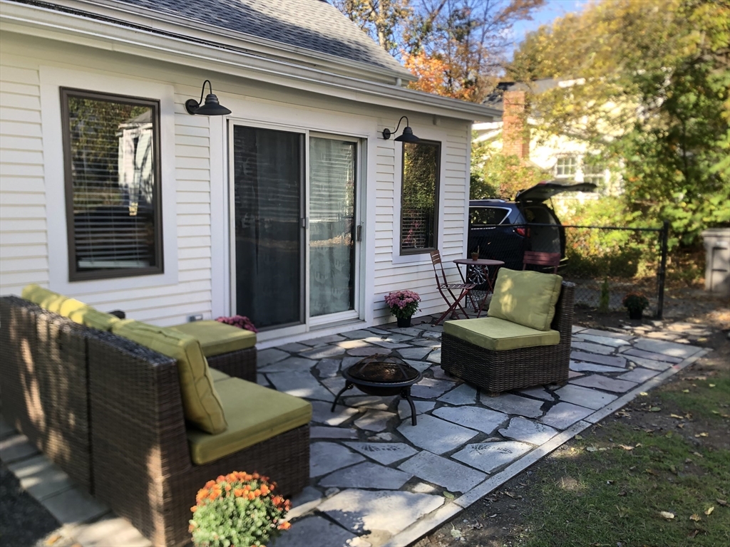 1 North Street Framingham, MA 01701 - Photo 19 of 22 a outdoor living space with patio furniture and a potted plant