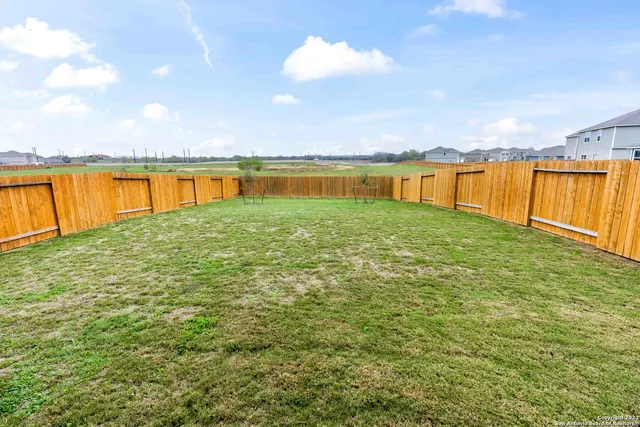 a view of a lake and a yard