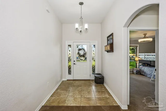 a view of hallway with livingroom