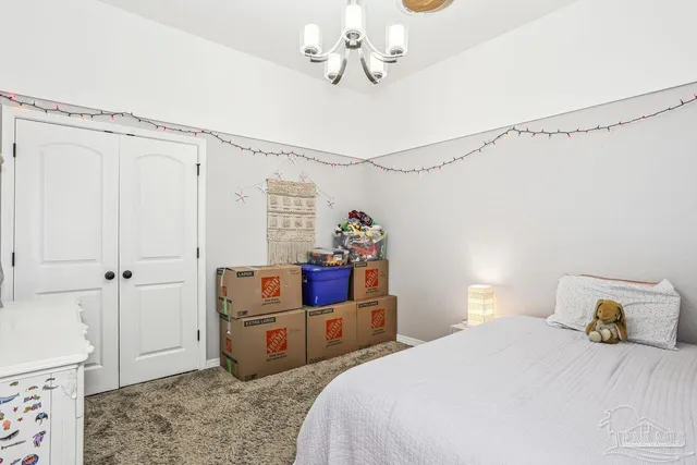 a room with furniture and a large window