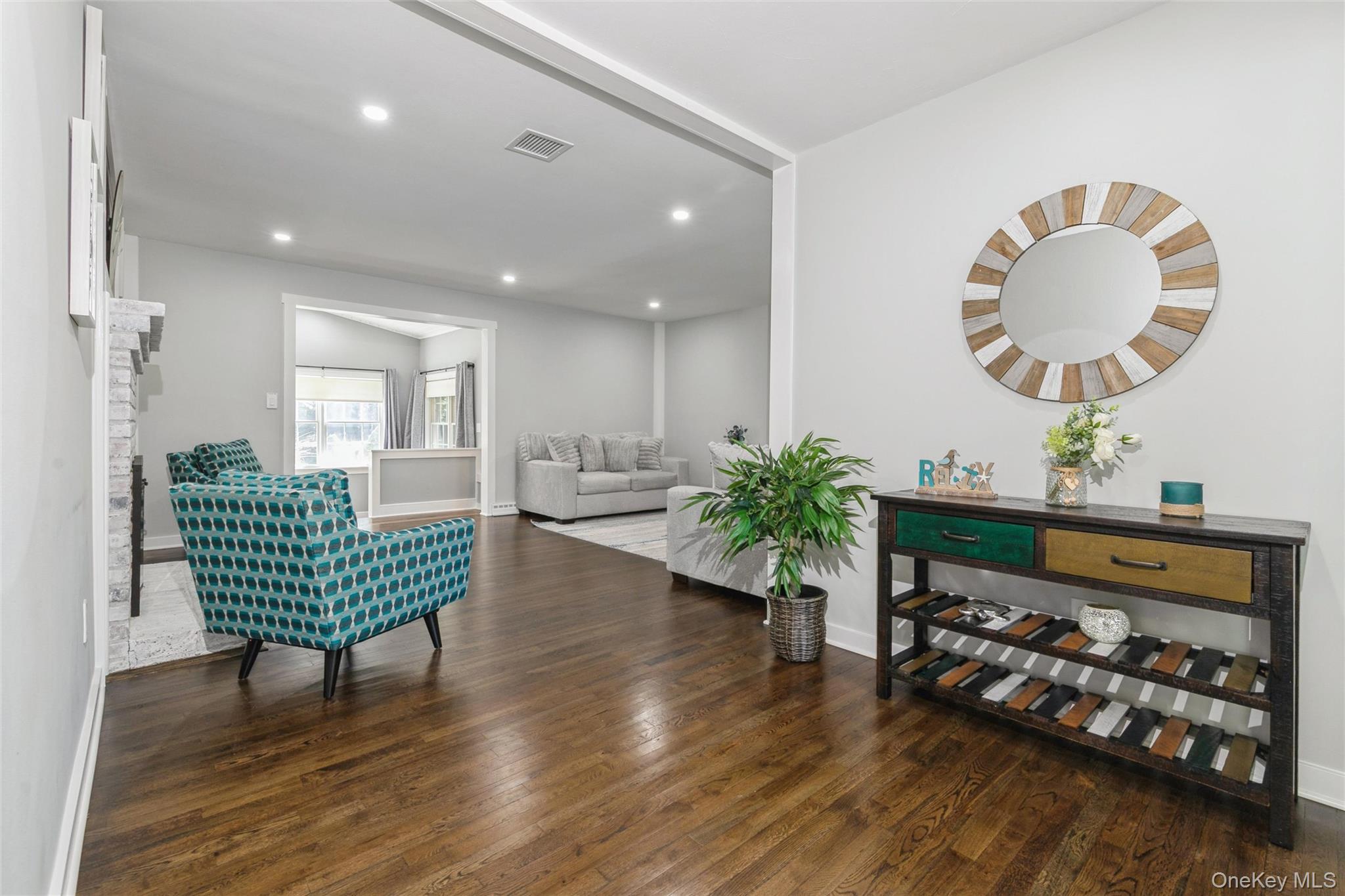 10 Rutland Road East Hampton, NY 11937 - Photo 11 of 47 a living room with furniture and a wooden floor