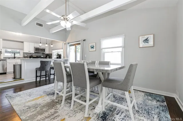 a view of a dining room with furniture