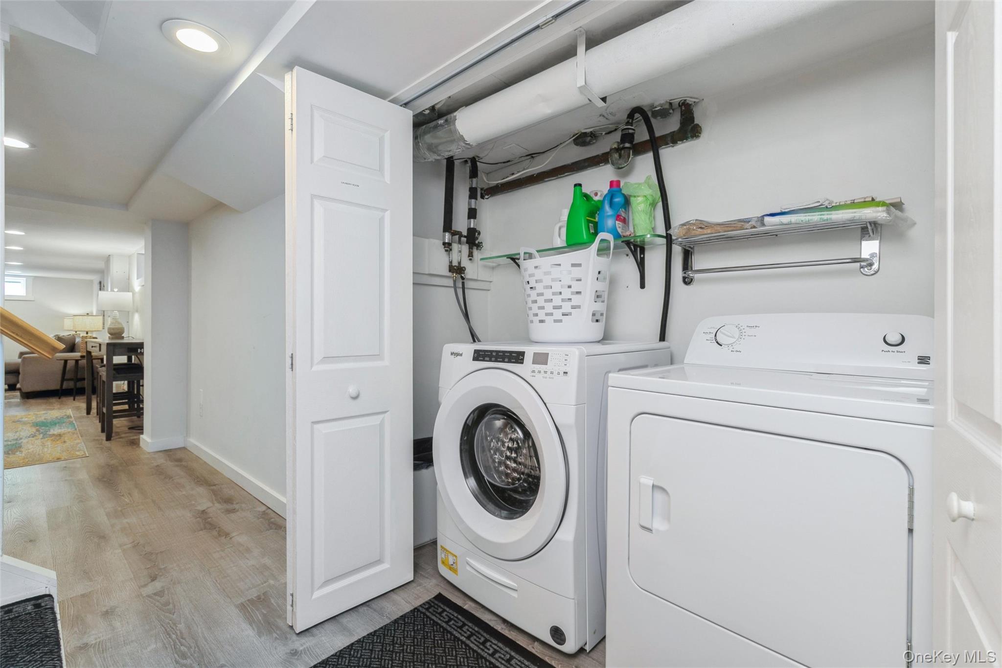 10 Rutland Road East Hampton, NY 11937 - Photo 24 of 47 a utility room with dryer and washer