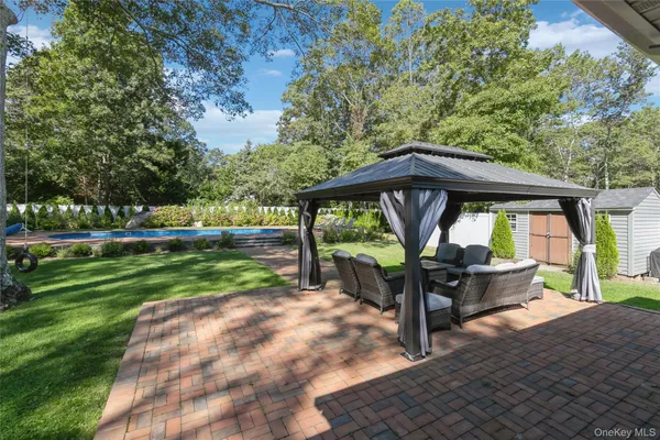 a view of a swimming pool with an outdoor space