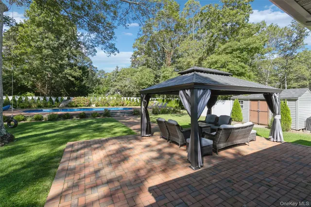 a view of a swimming pool with an outdoor space