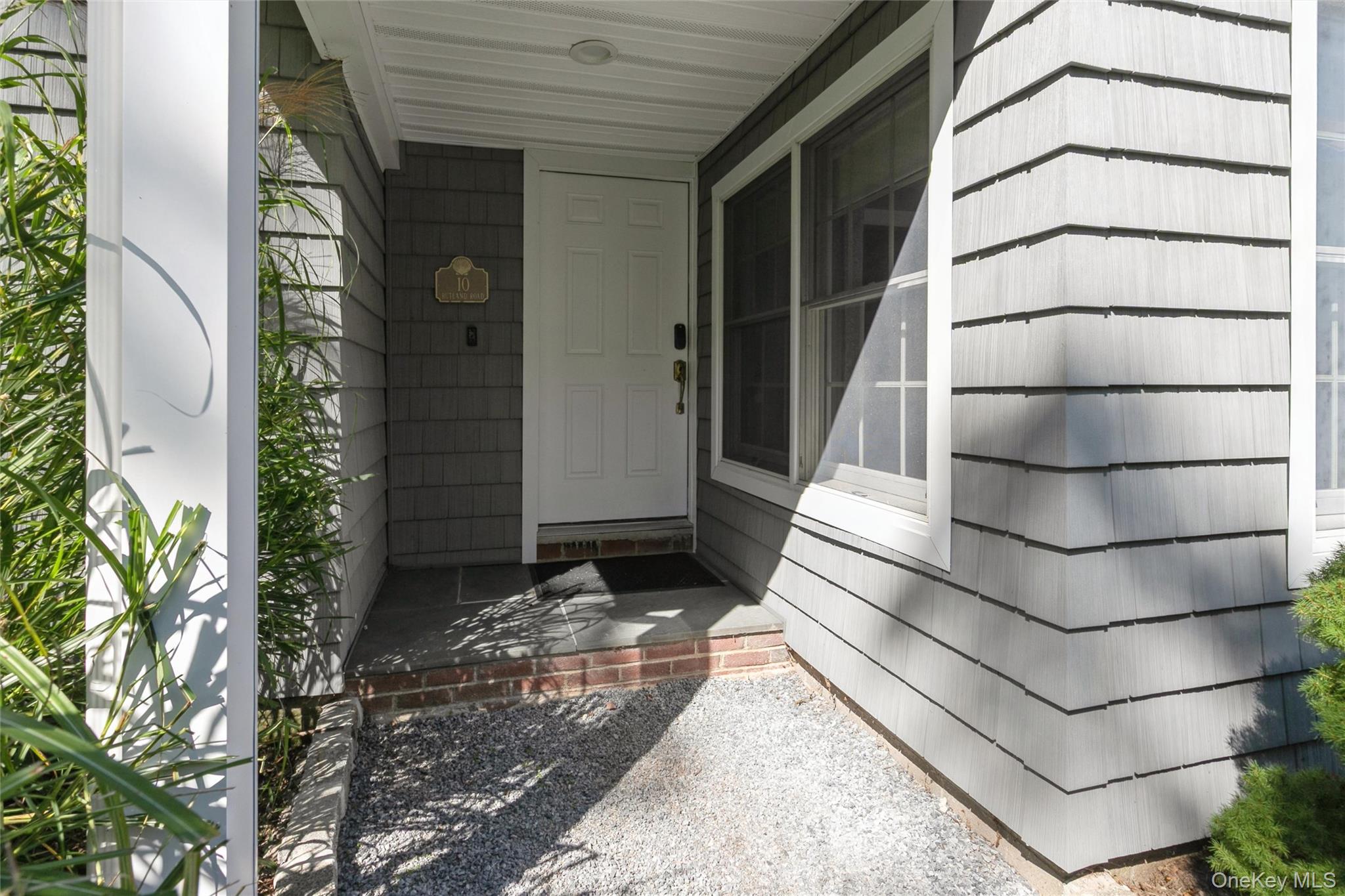 10 Rutland Road East Hampton, NY 11937 - Photo 3 of 47 a view of wooden door