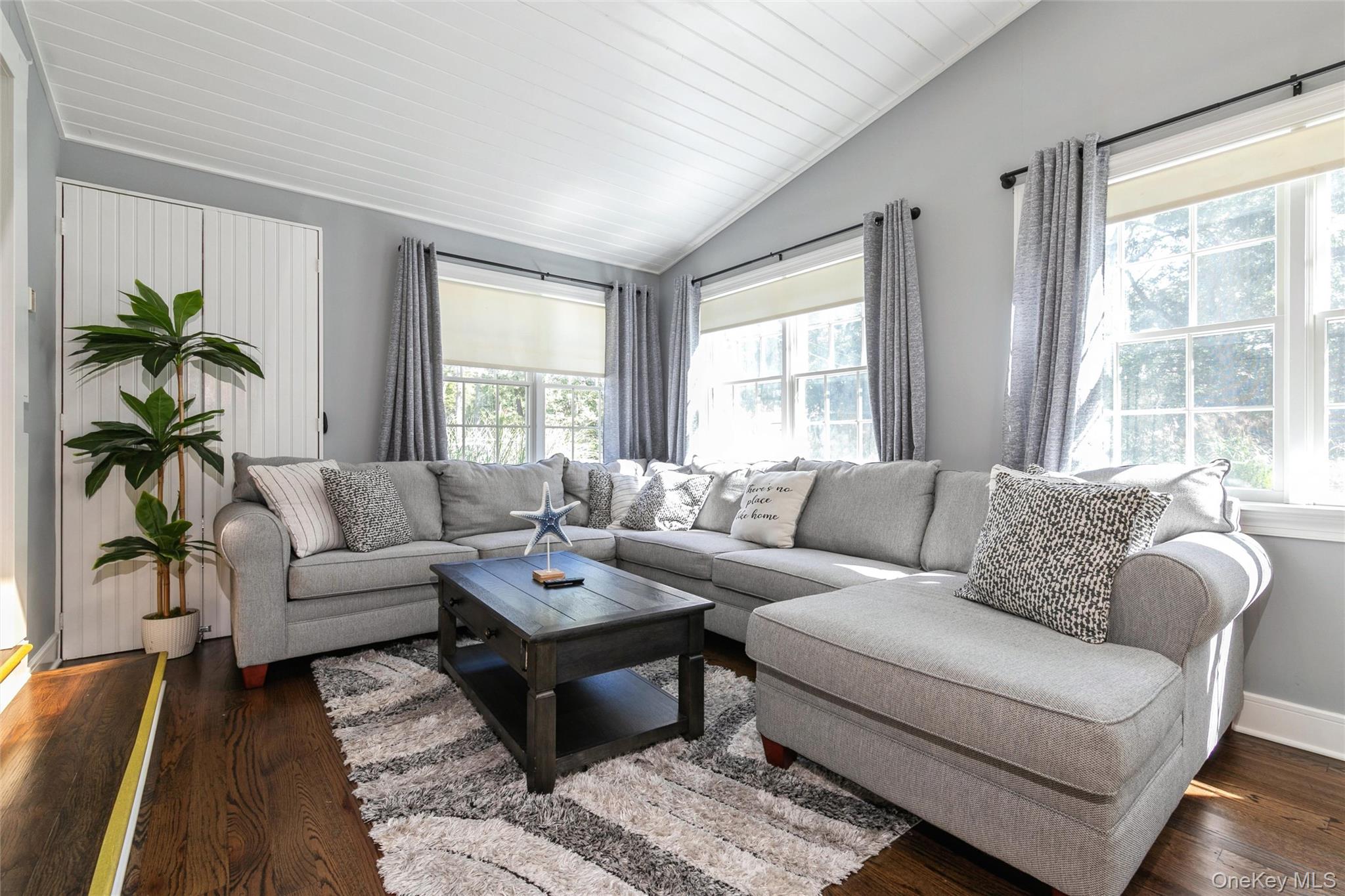 10 Rutland Road East Hampton, NY 11937 - Photo 6 of 47 a living room with furniture and a large window