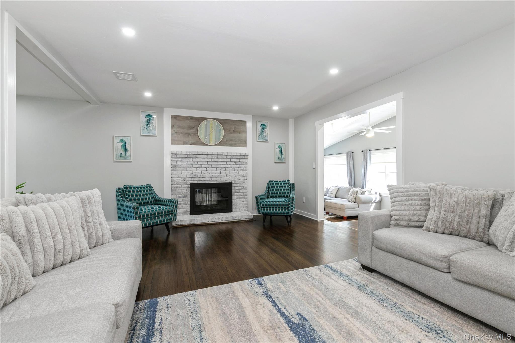 10 Rutland Road East Hampton, NY 11937 - Photo 8 of 47 a living room with furniture and a fireplace