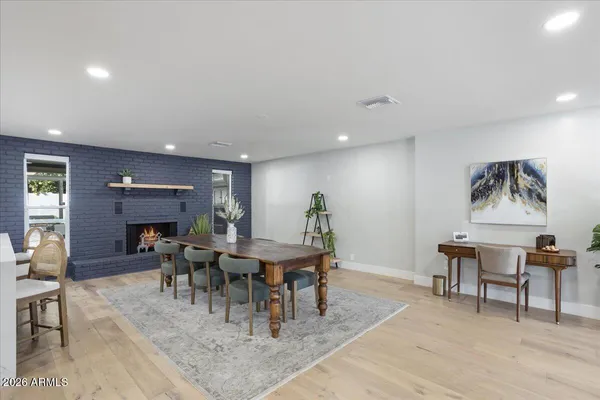 a view of a dining room with furniture
