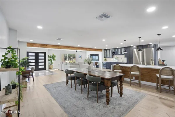 a view of a dining room with furniture