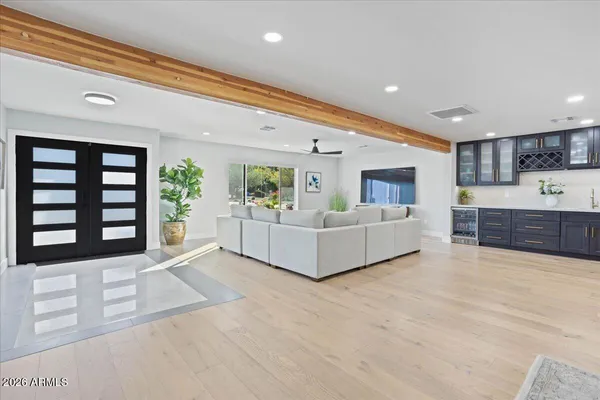 a living room with furniture and window