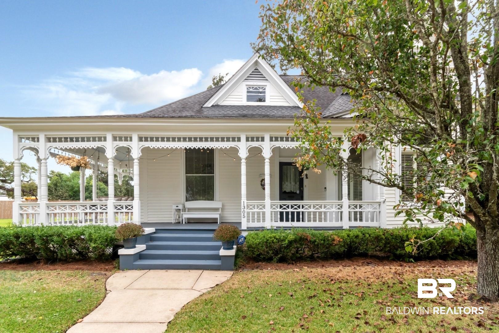 1305 Brown Street Mobile, AL 36604 - Photo 1 of 37 View of front facade featuring ceiling fan, a front lawn, and a porch