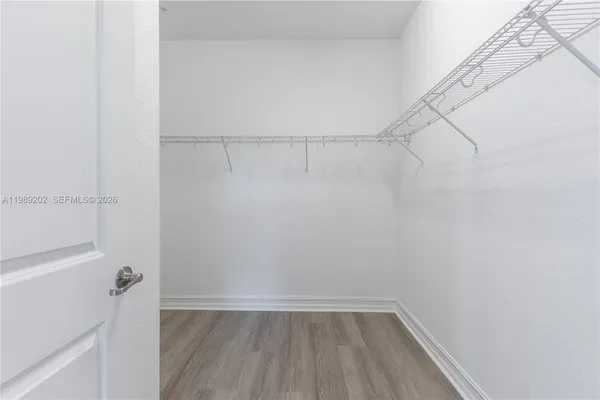 a view of an empty walk in closet