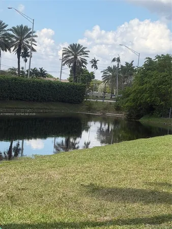a view of a lake from a yard