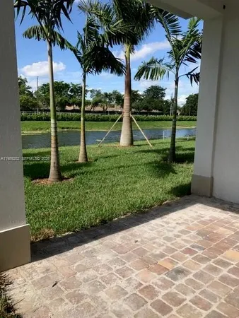 a view of a garden with a tree