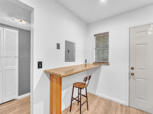 a workspace with furniture and window