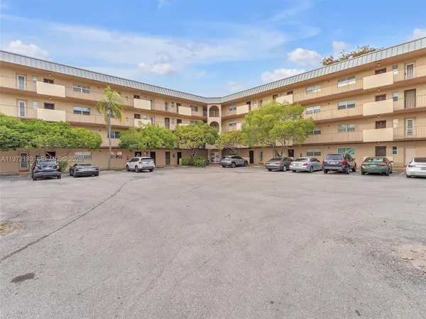 a view of a cars parked in front of a building